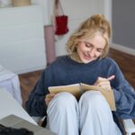 Woman writing in her diary