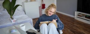 Woman writing in her diary